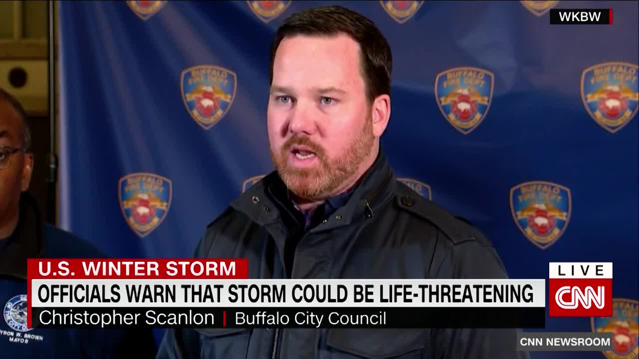 Woman tries to walk in deep snow after massive storm hits New York