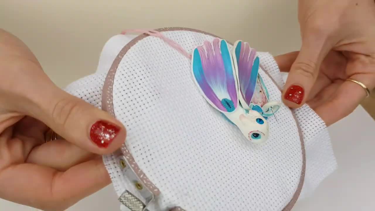 Needle minder for embroidery Dragon Sea. A gift for an embroiderer is a magnetic needle holder.