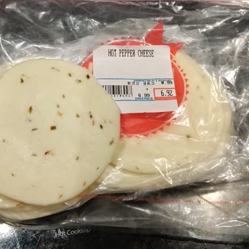 Eating Hot Pepper Cheese, Dearborn Italian Bakery, Ford Rd, Dbn, MI, 10/15/23