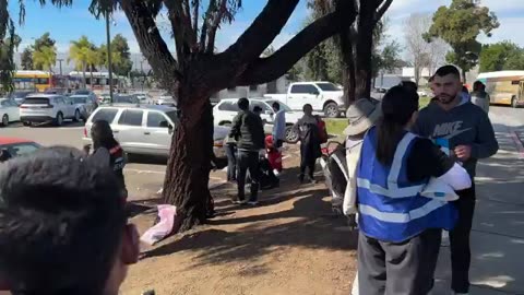 Busloads of Chinese unloaded in San Diego
