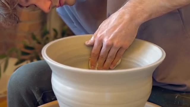 While waiting for the priest in the kitchen, he saw Paul sprinkle a handful
