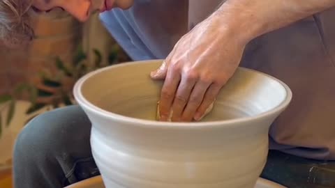 While waiting for the priest in the kitchen, he saw Paul sprinkle a handful