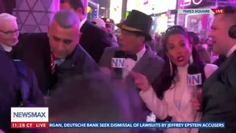 CNN's 'Elitist' Anderson Cooper Busts Through Newsmax's Live NYE Broadcast With His Security Team