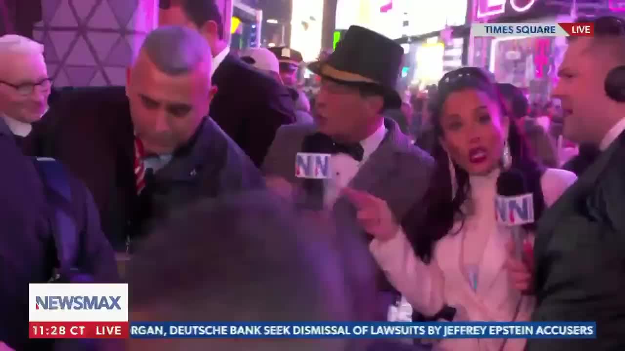 CNN's 'Elitist' Anderson Cooper Busts Through Newsmax's Live NYE Broadcast With His Security Team