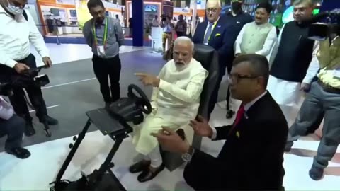 PM Modi driving a car in Europe while seated in India through 5G network. Check out the video.