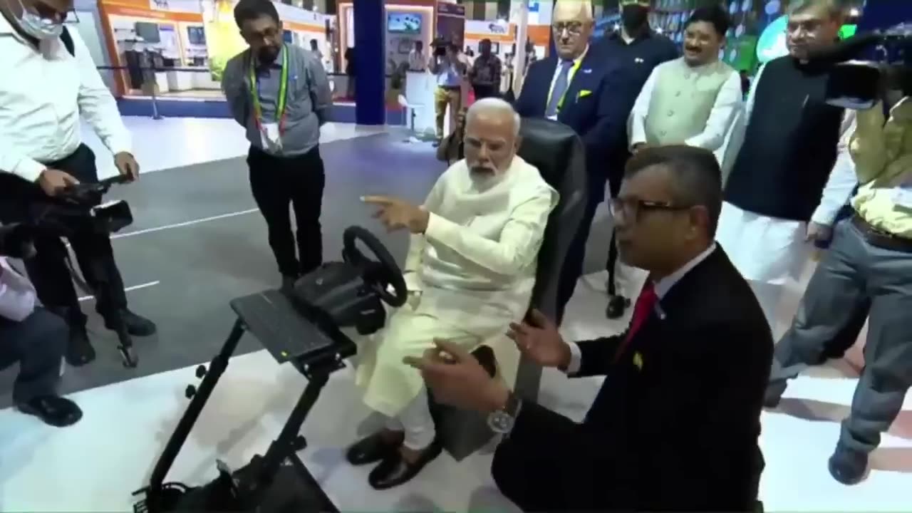 PM Modi driving a car in Europe while seated in India through 5G network. Check out the video.