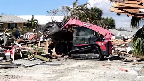 Heavy machinery starts Hurricane Ian clean-up