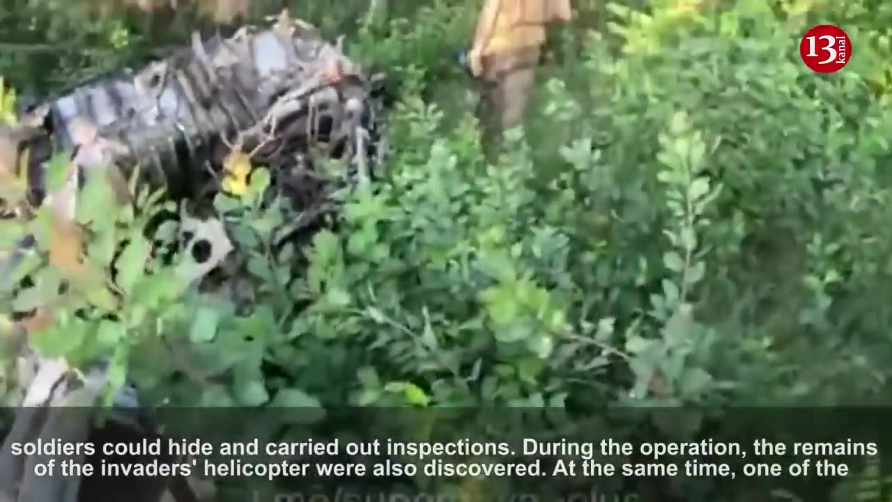 Ukrainian fighters find remains of a Russian helicopter while clearing Kleshyovka village