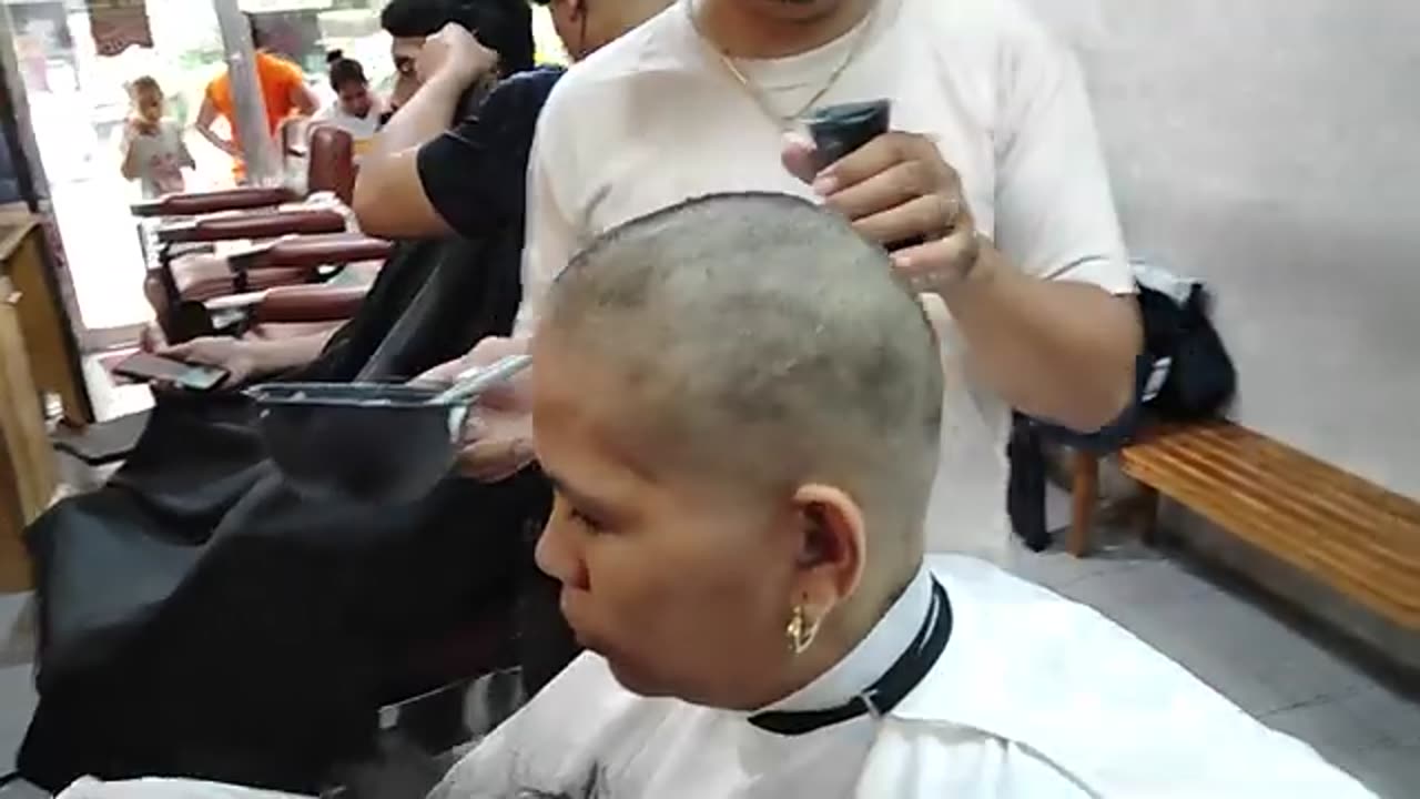 Headshave woman