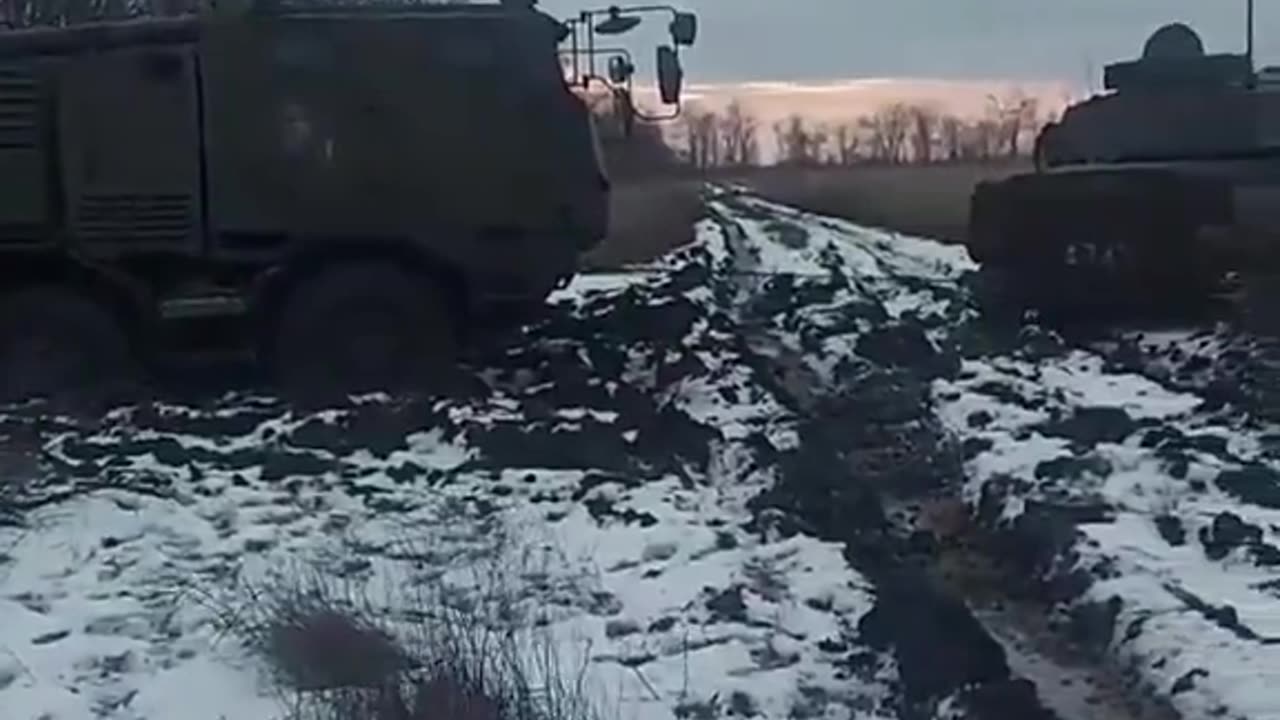 The 2S1 Gvozdika tracked self-propelled howitzer is attempting to pull out the CAESAR