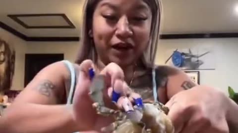 Clueless Woman Tears Crab Apart Alive Before Cooking It