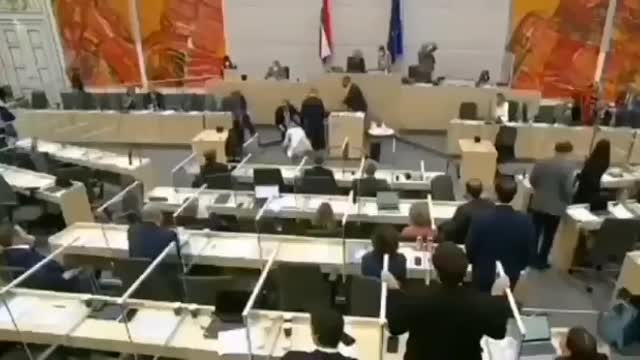 Austrian M.P collapses in Parliament.....Vaccinated