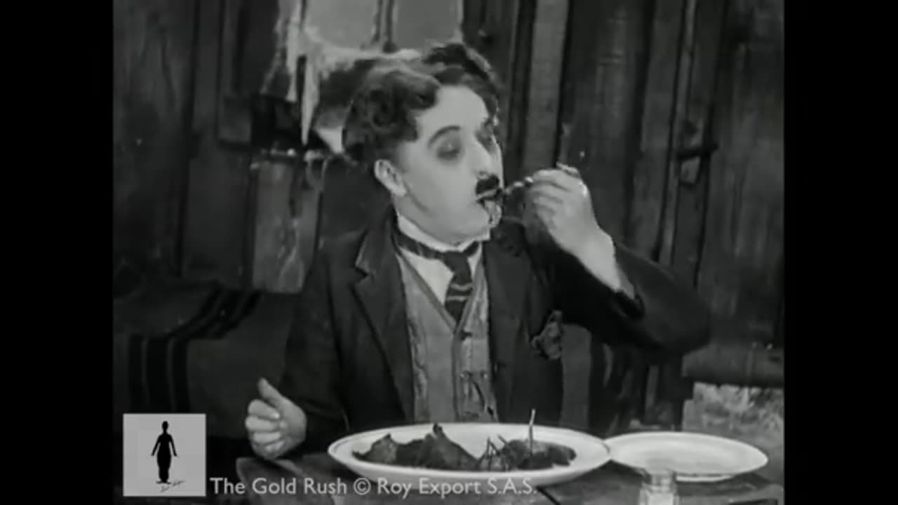 Charlie Chaplin Eats shoe | Celebraty World