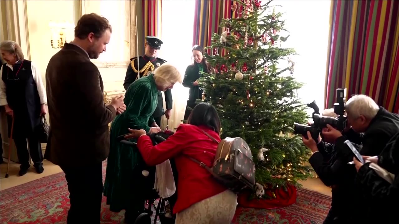 Queen Camilla adorns Christmas tree with disabled kids