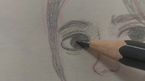 A simple pencil sketch of a girl's face.