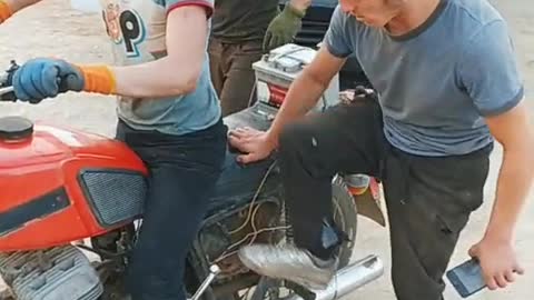 Several people can't start this motorcycle together.