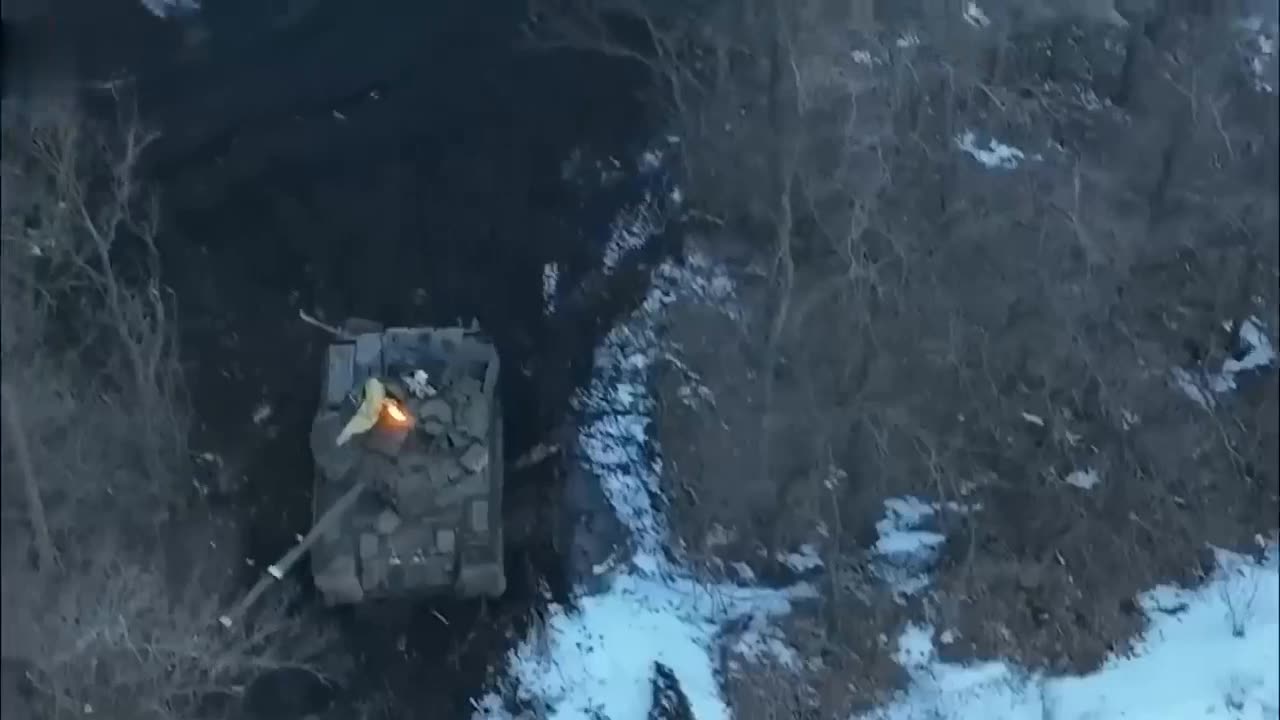 Russian tank tries to flee Ukraine drone and its bombs