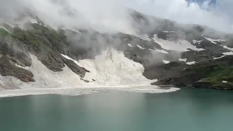MountainMist: Where Nature's Majesty Meets Serene Reflections
