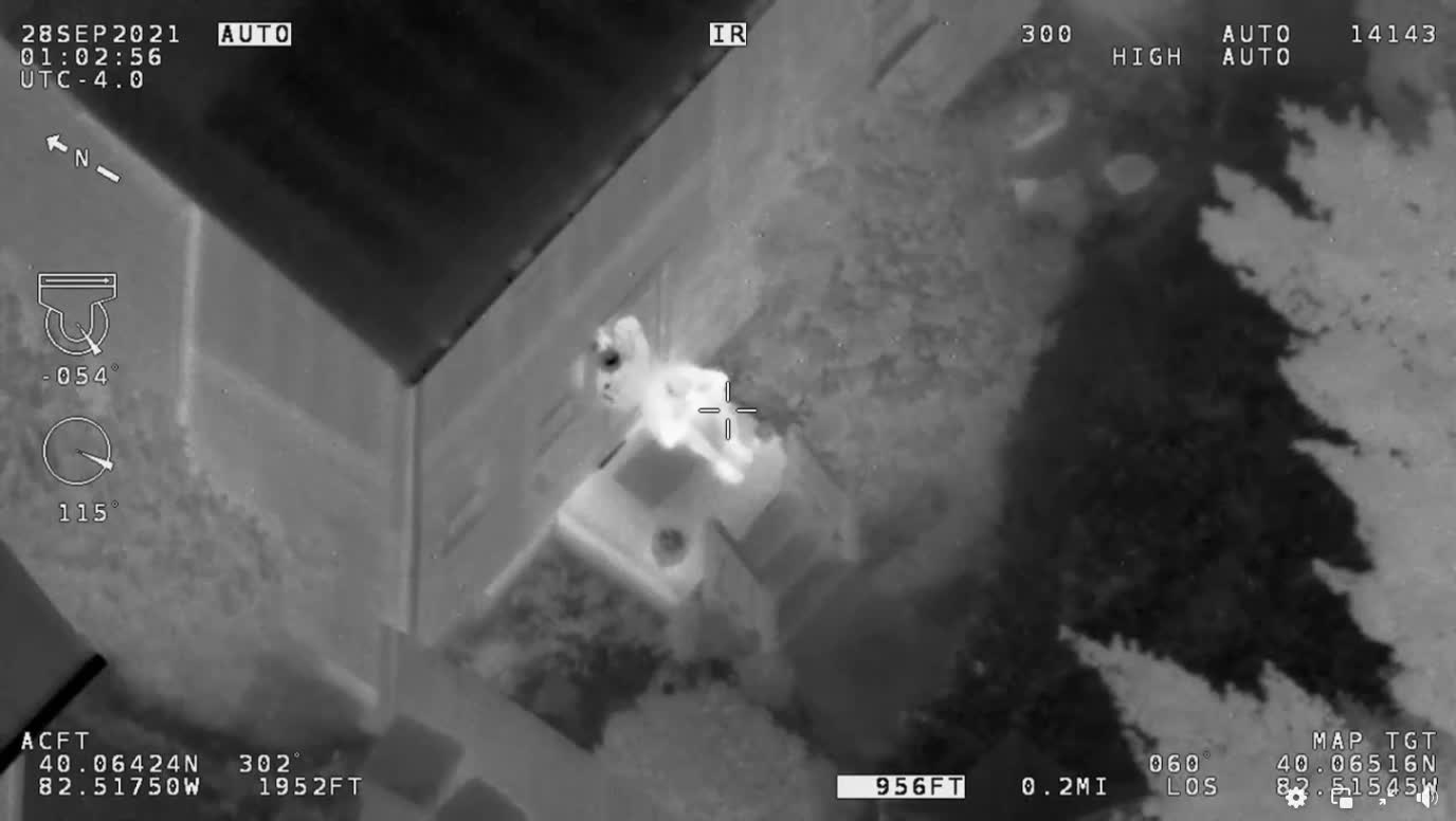 Helicopter View Police Chasing Suspects at Night