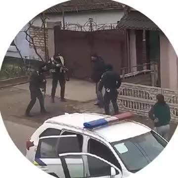 To the front at gunpoint