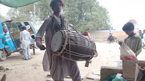 "Mastering the Dholl: An Explosive Performance"