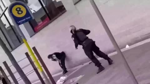 Female cop does nothing as partner gets beat up by savage knee grow in Australia LOL