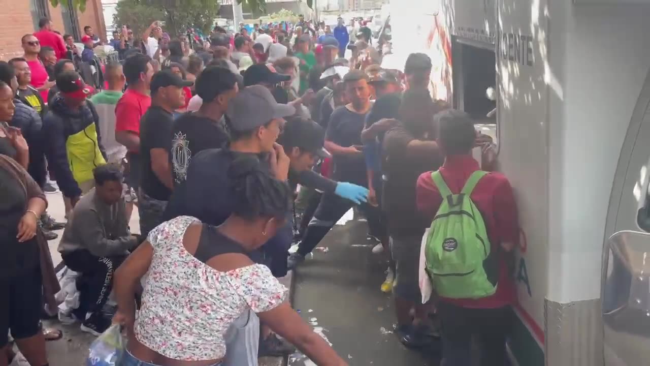 Planet of the Rapes. Migrants scramble for supplies in El Paso.