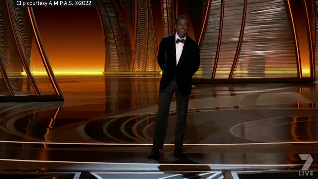 Watch the uncensored moment Will Smith smacks Chris Rock on stage at the Oscars, drops F-bomb