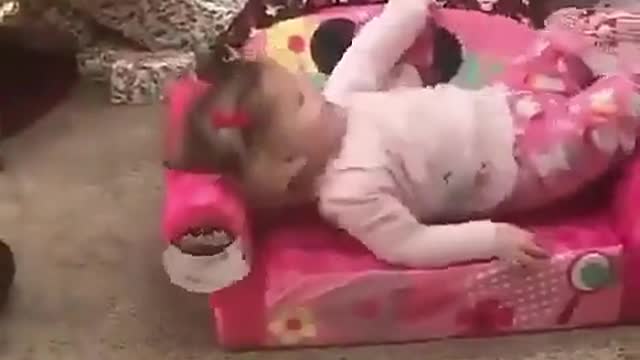 Cute little girl scream while openning dad present