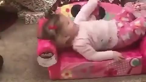 Cute little girl scream while openning dad present