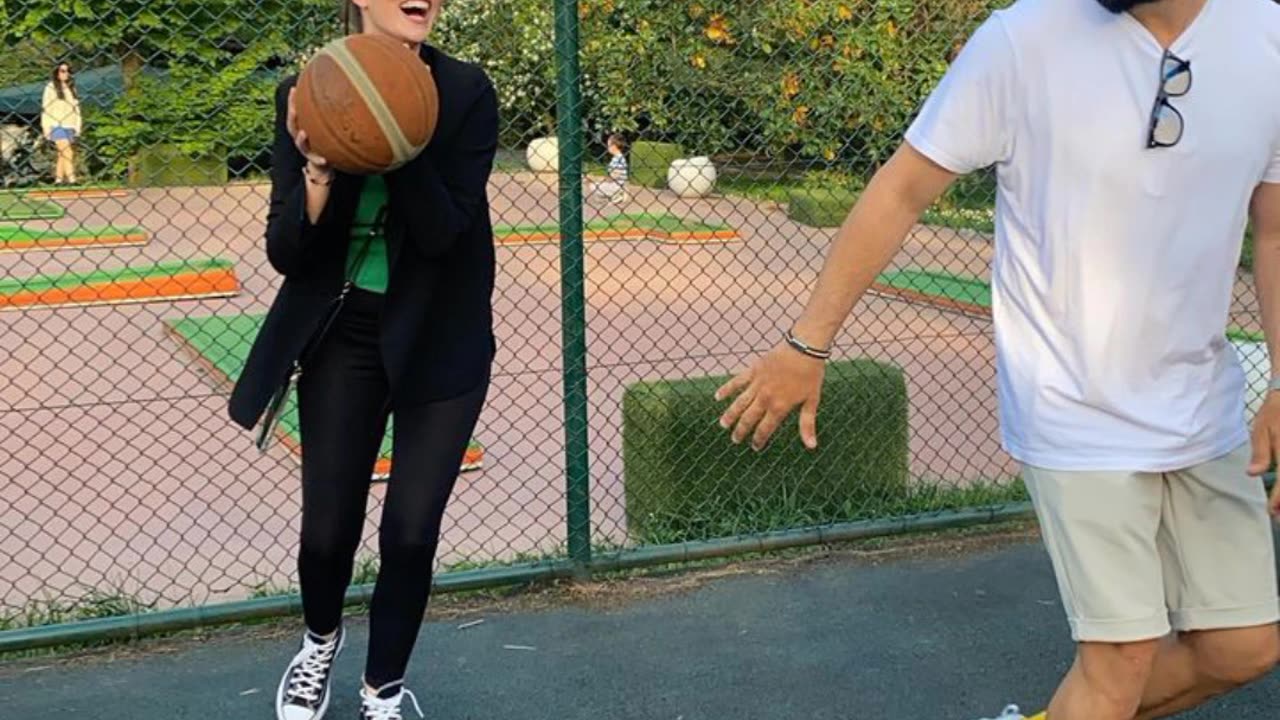 Burak Özçivit playing basketball with his wife