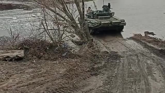 Ukrainians Crossing Shallow River in BMPs