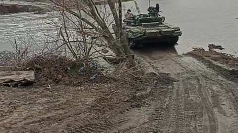 Ukrainians Crossing Shallow River in BMPs