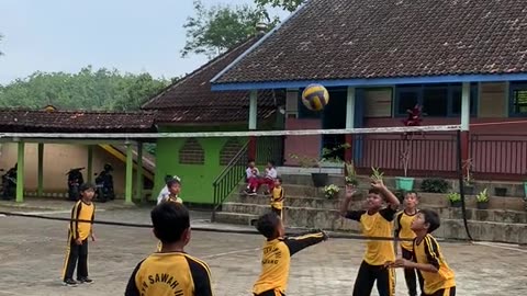 boy skills when serving volleyball