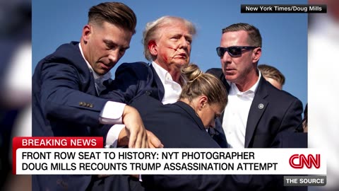 Photographer who took iconic photo of bullet near Trump's ear explains how he got the picture