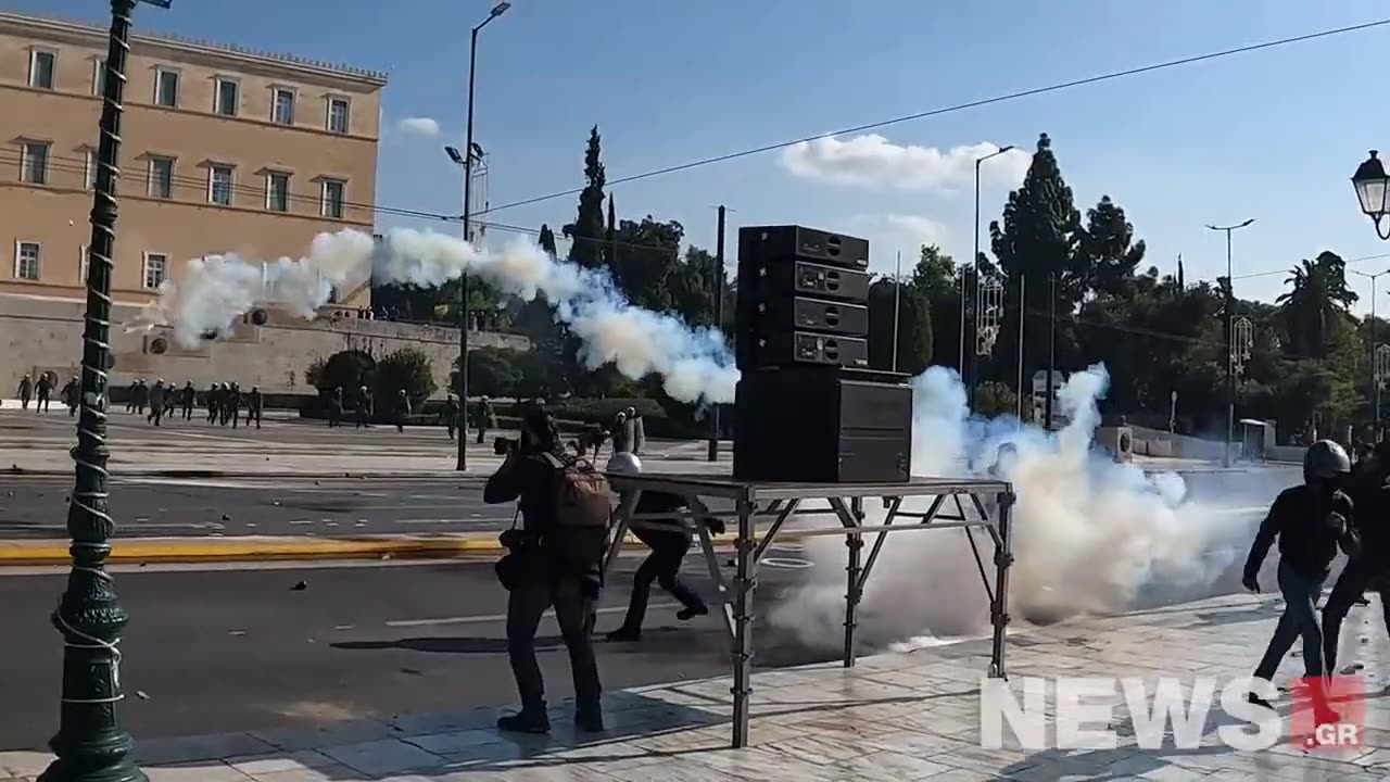 Molotov cocktails rain down in front of the parliament in Athens