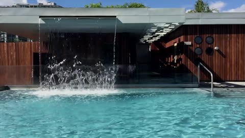 Water Running from Rooftop into Swimming Pool