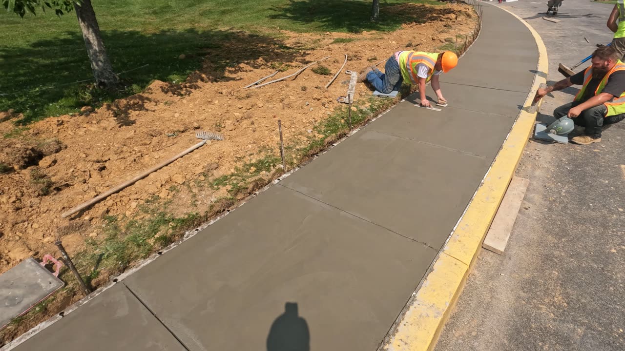 94 Degrees 120 feet of sidewalk