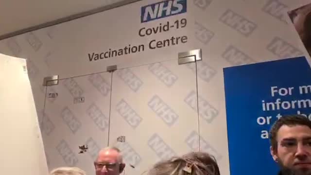 Today, Leeds UK: Anti-genocide by vaccine demonstration at a NHS 'vaccination' center.