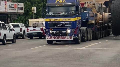 Mining Trucks Stop Traffic