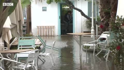 Severe flooding hits Spain's east coast after record rainfall - BBC News