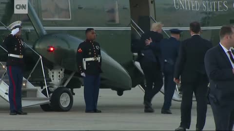 Trump stops to retrieve Marine's hat