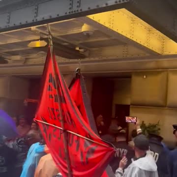 Climate change activists blocking entrances of the Federal Reserve in downtown Manhattan