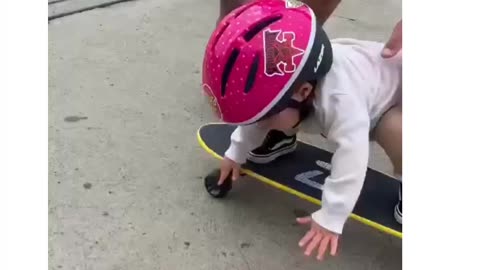 baby skateboarding