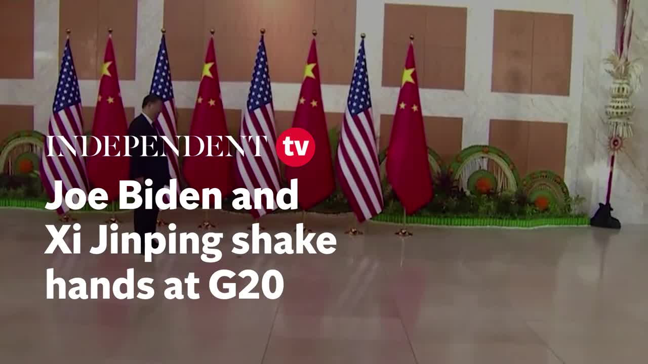 Joe Biden and XI Jinping shake hands at G20