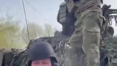 Ukraine War - Fighters from the Chechen Republic are hoisting a flag