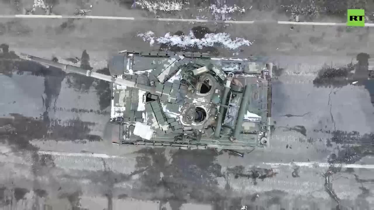 An abandoned tank and a column of Ukrainian military equipment destroyed in the Kherson region