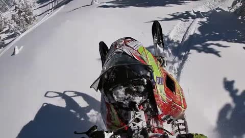 Guy Hit a Hidden Rock Riding His Sled Sending Him Over the Bars