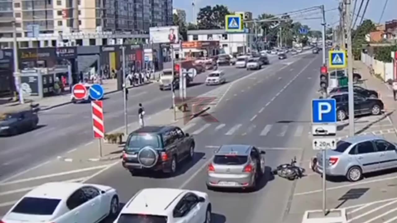Biker Struck By a Car Door