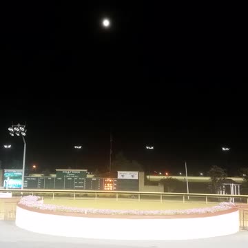 Moon over the winners circle